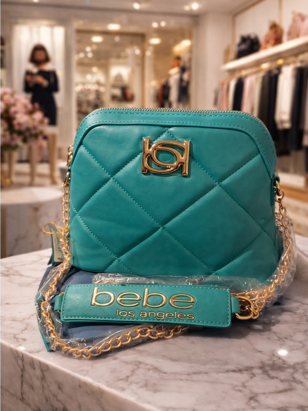 bebe Quilted Teal Crossbody with Gold Chain and Logo
